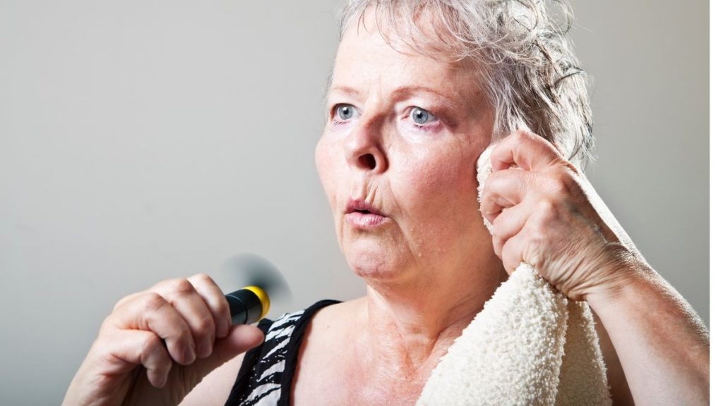 Image of a woman having a hot flash